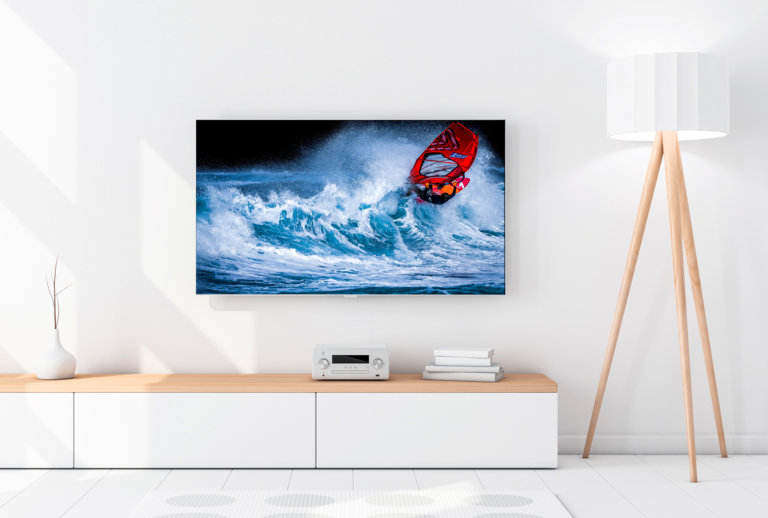 tv mounted on wall a